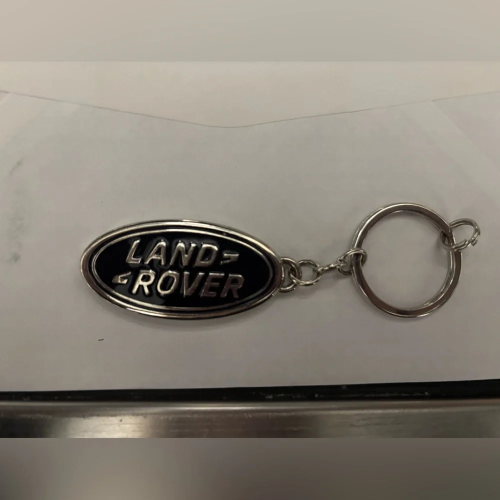 Blue and chrome Land Rover Keychain - Picture 2 of 3
